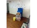 Room with hardwood floors, and various items stored at 3238 Campbell Dr, Charlotte, NC 28205