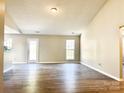 Spacious living room with vinyl flooring and neutral walls at 3216 Irwin Valley Ct, Charlotte, NC 28269