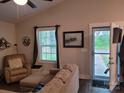 Spacious living room with comfy seating and natural light at 1025 Old Charlotte Rd, Statesville, NC 28677