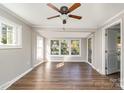 Sunroom with hardwood floors and ceiling fan at 118 E Maryland Ave, Bessemer City, NC 28016