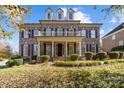 Beautiful two-story brick home with manicured lawn at 9440 Wallace Pond Dr, Huntersville, NC 28078