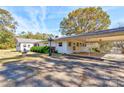 House with carport and side view of the lake at 2926 Englewood Dr, Shelby, NC 28150