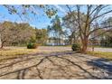 Front yard with a view of a lake and trees at 2926 Englewood Dr, Shelby, NC 28150