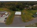 Aerial view of commercial property with building near a road at 907 Bethlehem Rd, Kings Mountain, NC 28086