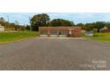 Brick firehouse building with three large garage doors and signage at 907 Bethlehem Rd, Kings Mountain, NC 28086