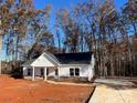 New construction home nestled in a wooded setting at 723 E Memorial Hwy, Harmony, NC 28634