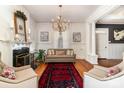 Elegant living room featuring a fireplace and comfortable seating at 70 Spring Nw St, Concord, NC 28025