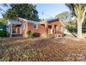 Brick ranch house with covered porch and ample yard space at 24947 Nc 24/27 Hwy, Albemarle, NC 28001