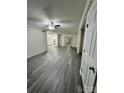 Spacious living room with grey vinyl flooring at 2123 Carriage Woods Ln, Kannapolis, NC 28081