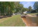 Lakefront home with private dock and screened porch at 364 Catalina Dr, Mooresville, NC 28117