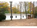 White mobile home with wooden porch at 2869 9Th Se Ave, Hickory, NC 28602