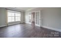 Bright office with hardwood floors and french doors at 10881 Greenvale Dr, Harrisburg, NC 28075