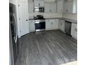Modern kitchen with stainless steel appliances and gray flooring at 929 Roxburgh Ave # 51, Rock Hill, SC 29732