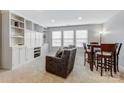 Bonus room with built-in shelving and seating area at 7006 Garden Hill Dr, Huntersville, NC 28078