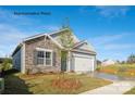 One-story home with stone and gray siding, and a two-car garage at 8039 Plymouth Dr, Sherrills Ford, NC 28673
