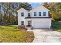 Two-story white house with a two-car garage at 1403 Gentry Pl, Salisbury, NC 28146