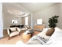 Virtually staged living room featuring comfortable seating and a stylish coffee table at 3810 Port Richmond Ave, Gastonia, NC 28056