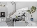 Bright and airy living room with high ceilings and modern decor at 7409 Delta Lake Dr, Charlotte, NC 28215