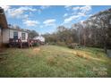 Spacious backyard with a deck and wooded area at 108 Leslie Dr, Shelby, NC 28152