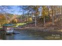 Private boathouse with covered boat slip and waterfront access at 466 Lakeview Shores Loop, Mooresville, NC 28117