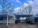 Carport and basketball hoop in the backyard of this single-Gathering home at 1060 Mcdow Dr, Rock Hill, SC 29732