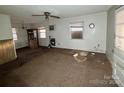 Spacious living room with wall-to-wall carpeting and large windows at 1060 Mcdow Dr, Rock Hill, SC 29732