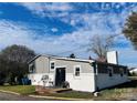 Gray house with white accents and a large backyard at 2202 16Th Ne Ave, Hickory, NC 28601