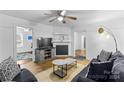 Spacious living room with hardwood floors and open floor plan at 627 Brevard St, Statesville, NC 28677