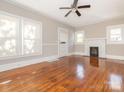 Living room with hardwood floors and a fireplace at 1411 Lineberger Ave, Gastonia, NC 28052