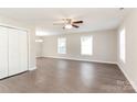 Bright living room with hardwood floors and ceiling fan at 714 Knots Lndg, Clover, SC 29710