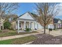 Craftsman style home with front porch and two car garage at 9311 Glenashley Dr, Cornelius, NC 28031