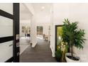 Spacious entryway with a view into the living area and kitchen at 9000 Boyd Dr, Matthews, NC 28105