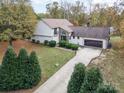 Two-story house with a large yard and attached garage at 1045 Winterfield Dr, Mooresville, NC 28115