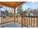 Inviting front porch with wooden railings and street view at 647 Simpson St, Rock Hill, SC 29730