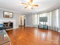 Spacious living room with hardwood floors and fireplace at 1043 Candlewood Ln, Rock Hill, SC 29730