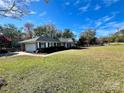 Brick ranch home with attached garage and large yard at 5486 Kershaw Camden Hwy, Heath Springs, SC 29058