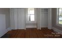 Spacious bedroom with hardwood floors and ample closet space at 7318 Old Mt Holly Rd, Charlotte, NC 28214