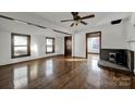 Living room with hardwood floors and fireplace at 2518 Toddville Rd, Charlotte, NC 28214