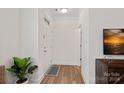 Bright and airy foyer with hardwood floors and access to other rooms at 208 Waterlynn Ridge Rd # B, Mooresville, NC 28117