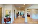 Open concept living area with hardwood floors and access to the backyard at 811 Irish Creek Dr # 1, Landis, NC 28088