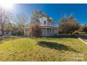 Large Victorian home with wraparound porch and expansive lawn at 307 Kings Mountain St, Clover, SC 29710