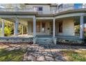 Home's entrance featuring a wide porch with stone steps and columns at 307 Kings Mountain St, Clover, SC 29710