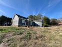 Newly built home with gray siding and attached garage at 1517 Sugarfarm Rd, Catawba, NC 28609