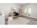 Bright home office featuring a desk, chair, and built-in shelving at 2304 Via Dei Conte Aly, Charlotte, NC 28205