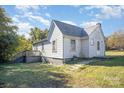 White sided home with a deck and large backyard at 130 E Branch Ave, Shelby, NC 28152