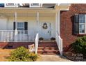 Front porch features white columns and a white door at 508 White Dove Ct, Rock Hill, SC 29730