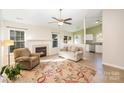 Spacious living room with a fireplace and open concept layout at 2027 Arboretum Rd, Rock Hill, SC 29732