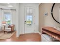 Bright and airy entryway with hardwood floors and natural light at 1037 Kinship Dr # 75, Lancaster, SC 29720
