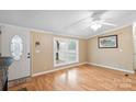 Living room with hardwood floors and fireplace at 5112 Green Leaf Ct, Mount Holly, NC 28120