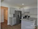 Modern kitchen with stainless steel appliances and an island at 536 Fourth St # 9, Chester, SC 29706